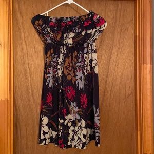 Strapless floral dress. Hits right at the knee.